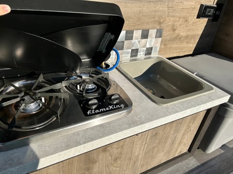 Two burner stove and sink.  