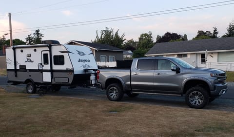 Height of camper in comparison to a full size truck with a 6 inch suspension lift.