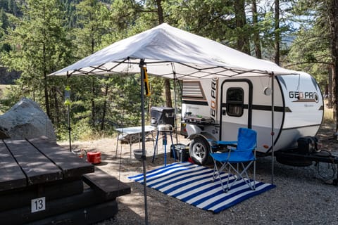 Full Camp Setup. Fridge, Coleman stove and two camp chairs included. Skottle grill and Canopy shelter can be added on.