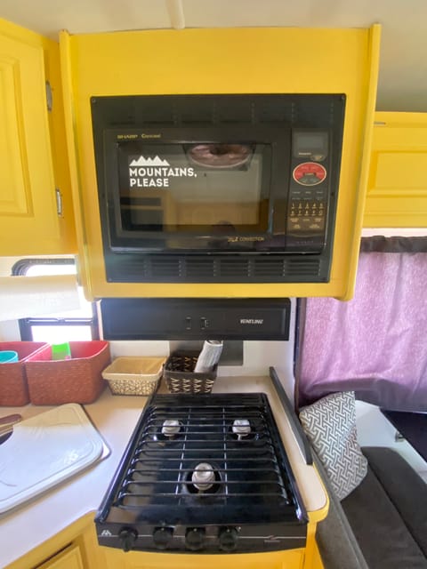 convection/microwave oven and three burner stove