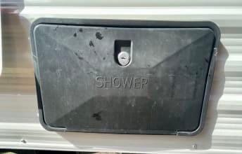 outdoor shower- located on back end of the camper.