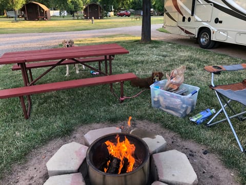 We often stop at a campsite and just relax after a long drive. We equip our RV camping chairs and a folding table.