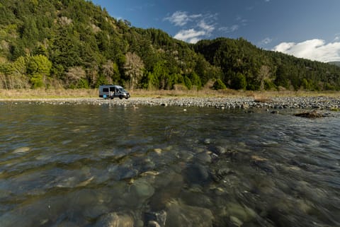 2021 Ford Transit AWD, 200 miles a day, Hot indoor shower, roof deck Campervan in Troutdale