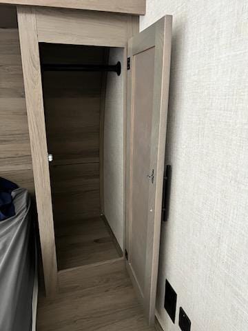 Closet storage space on either side of master bed. 