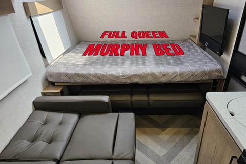 A full size queen bed. Woohooo!