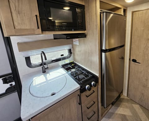 The indoor kitchen is perfect for starting the coffee in the morning or for that box of macaroni for the kid who wasn't hungry but who's now starving.