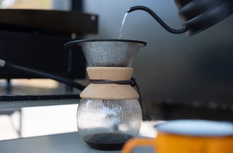 Start your day with pour-over coffee at the outdoor kitchen! The pour-over set is included!