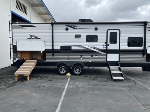 Optional dog ramp that leads to extra storage or a great place for your furry friend to relax. Has a gate that leads to inside of trailer. 