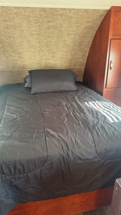 Queen size bed, with two pillows 