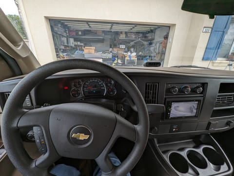 Driver seat view with backup camera and tire pressure monitor system.