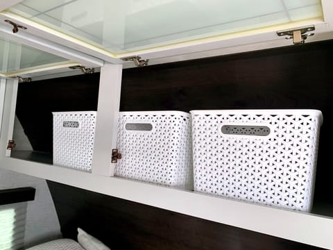 Above bed storage. Organization cubes included. 