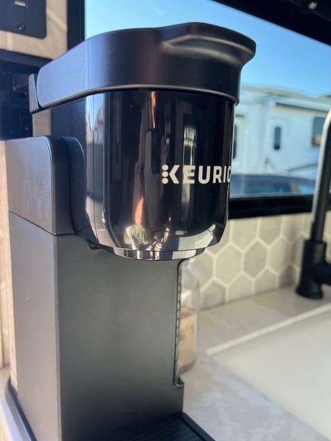 Keurig provided with complimentary Starbucks, sugar and creamer