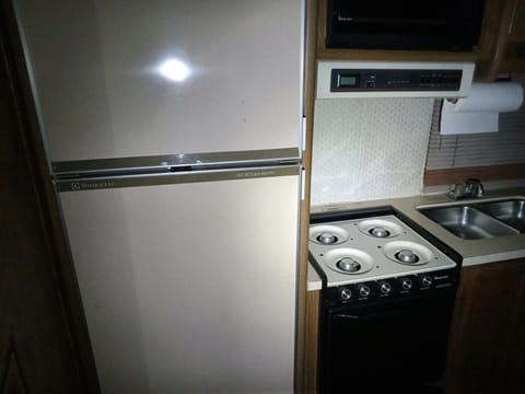 Refrigerator and stove microwave