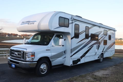 The Mackenzie!! Travel in style in the 31-foot 2023 Thor Freedom Elite Drivable vehicle in Southlake