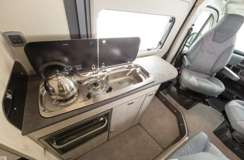 Kitchen Area with Sink and Storage