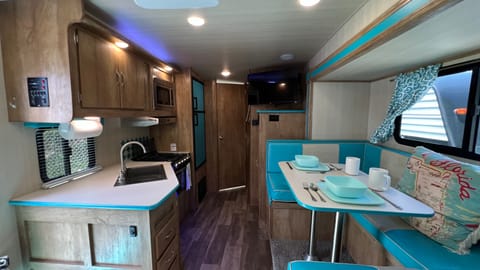 Slide-out makes the Vintage Cruiser very roomy!  Plenty of counter space for preparing meals.