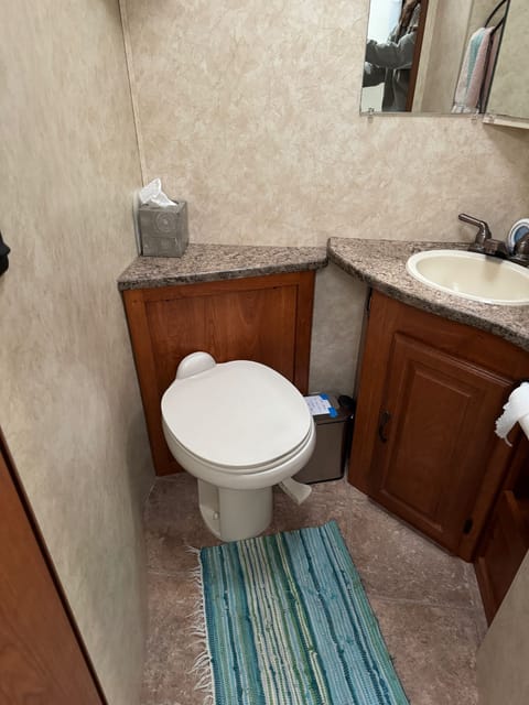Bathroom - toilet and sink work well. We ask that you do not flush paper products, as to not clog the tank. Trash can is provided for this use. 