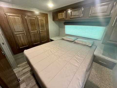 Queen size bed with 3” luxury mattress topper and generous closet storage all around. 