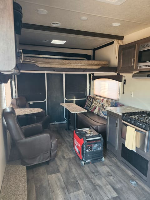 Very spacious
Two queen size bunkers tucked out of your way.open kitchen with everything you need, air fried, coffee pot, microwave, 4 burner range, nice size oven!