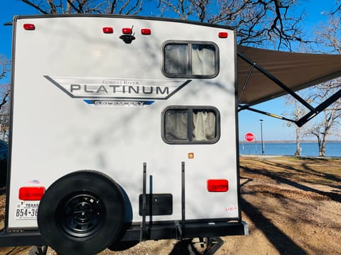 The trailer's back. The two windows are for each bunk bed.