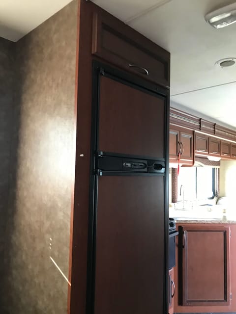 One of our very favorite features on this motorhome, this is the full-sized fridge and freezer.  We also provide ice cube trays for those who may need those (like us).  For a fee, we will also provide groceries should you want those.