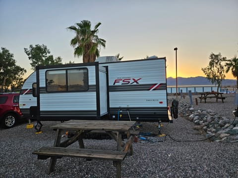 Beautiful demure desert explorer with slide out for a huge floor plan! Small enough for a large SUV or small truck to tow! The views outside the trailer are always the best views of the trailer!