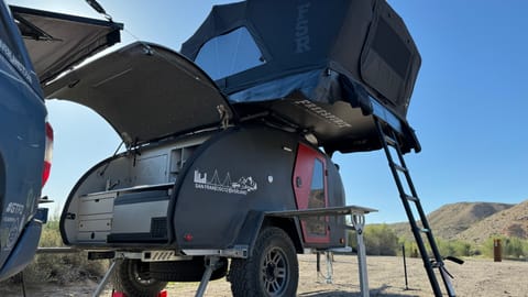 Lucy, our 2024 Escapod Voyager TOPO2 w/ FSR Premium Hybrid Roof Top Tent Towable trailer in Larkspur