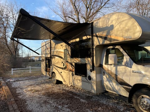 Built for family fun, this RV has an outdoor fridge, sink, and television