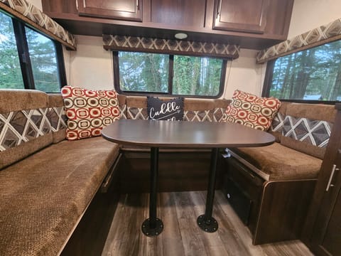 Room for everyone around the table.

Dinette converts into a comfortable bed.