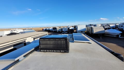 A/C unit and 400W solar panels.