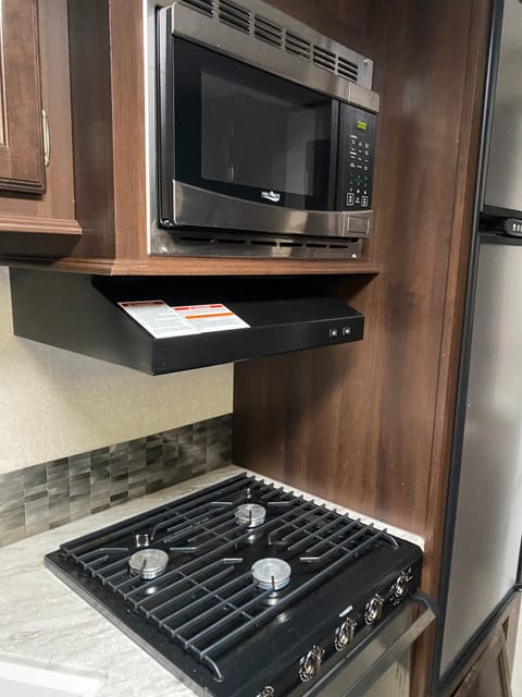 Stove with oven and microwave 