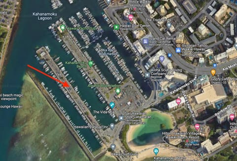 If you're visiting Waikiki and need free overnight parking, let me know and we can discuss the details.  This map location is in the area of the Ala wai boat harbor.  At this location, you can park overnight and sleep in the van.  There is a beach shower just down the road.   

The van is permitted to park in the YELLOW marked parking 24HR/DAY.  

During the day (4:30am-10:30pm) you can park in the WHITE spaces.