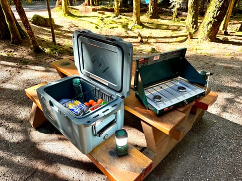 High performance cooler that can keep ice frozen for days. 
Two burner stove (we provide a propane bottle with each rental)
Smart lantern (charge it while driving and it will charge your devices while camping)
