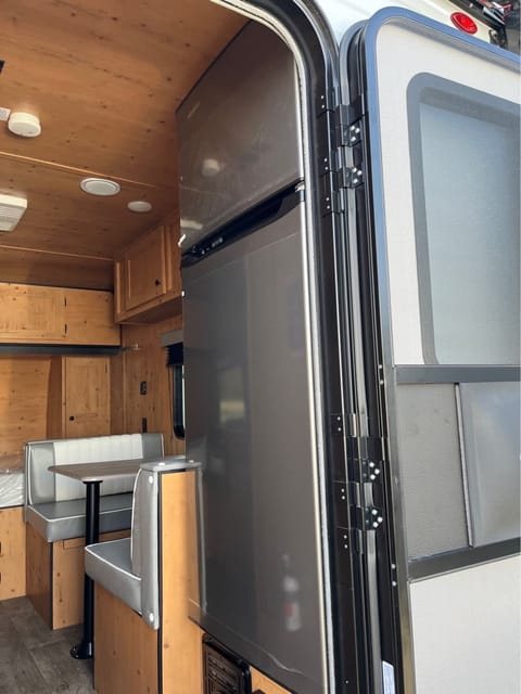 Camp outdoors or in town with a perfect size RV. Towable trailer in Villa Park
