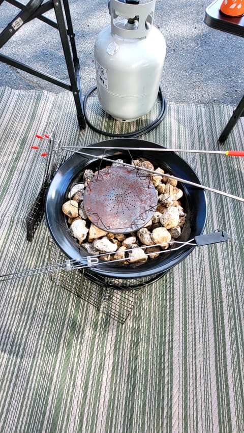 Fire bowl with propane tank & all the camp fire cooking essentials! Smore sticks, cooking grill, campfire toast maker & fire cooking griddle.