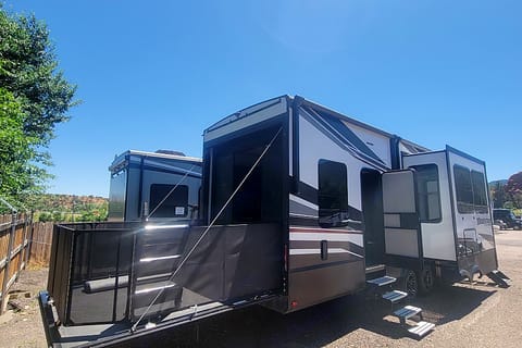 2022 Grand Design Momentum M-Class Toy Hauler in Colorado Towable trailer in Woodland Park