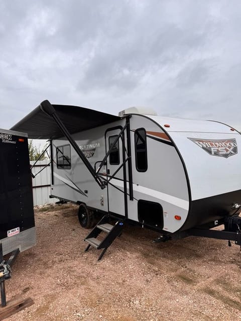 Electric awning for a little shade.