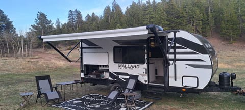 Mighty duck has everything you need to feel at home in the wilderness. Towable trailer in Laramie