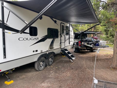 Awning runs almost the full length of the RV.