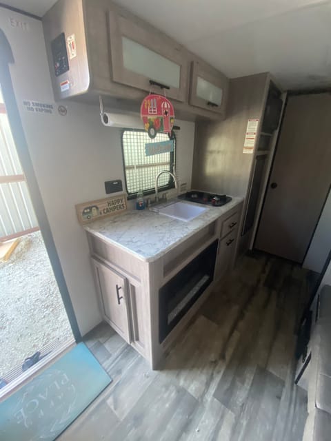 Kitchen with stove and microwave and fridge 