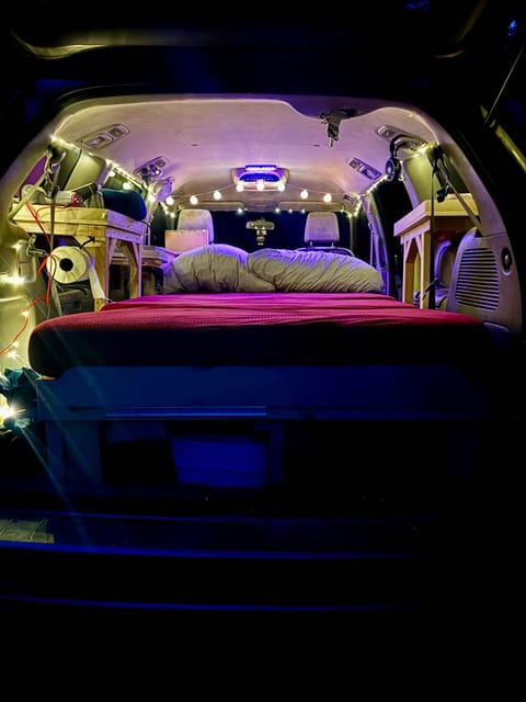 Sleeping mood-Sofa cum bed in bed position with lights, fan