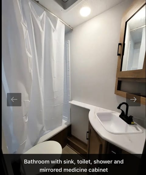 There is a full bathroom right in the unit 