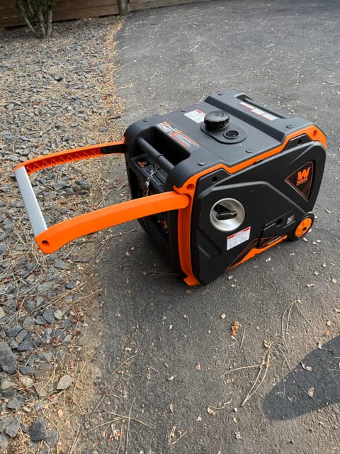 WEN generator with wheels and carry handle.