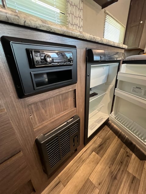 Indoor/Outdoor speaker system along with a mini fridge with built-in freezer drawer