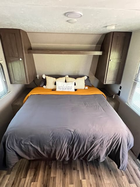 Queen bed with duel wardrobe closets plus night tables with USB and electrical outlets.