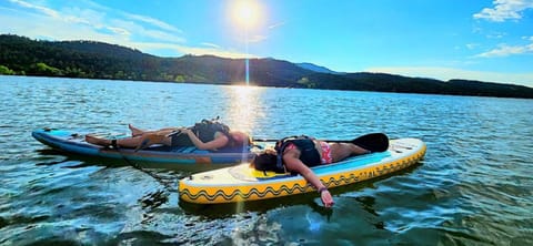 Paddle boarding and kayaking at Carter Lake. SUP & kayak available for rent!