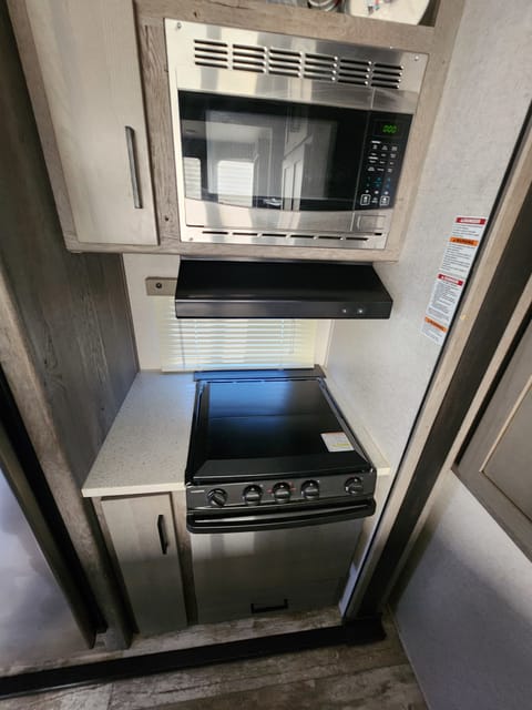 microwave, hood, and oven