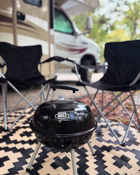 Portable charcoal grill and chairs available for add-on.