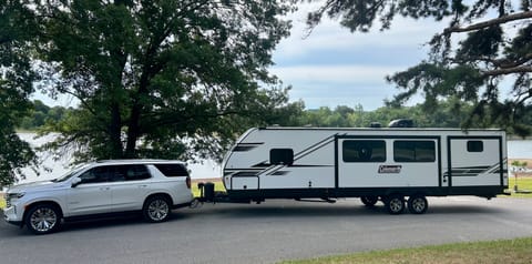 1/2 ton or full size SUV in order to tow