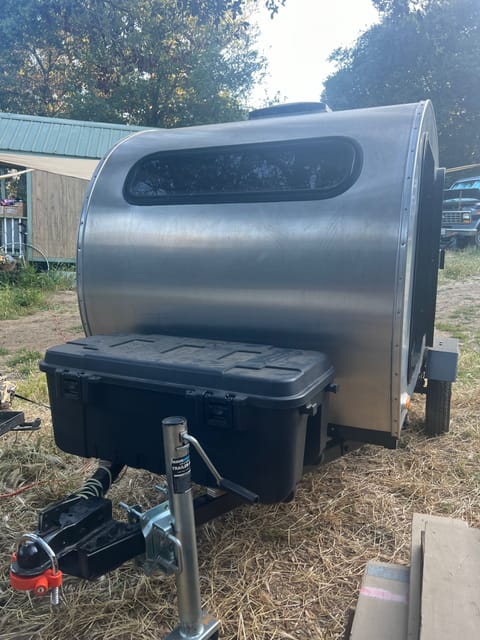 Storage box in the front for miscellaneous items. 